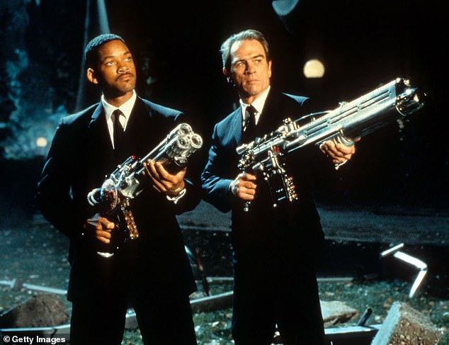 The movie is Men in Black with Will Smith and Tommy Lee Jones from 1997