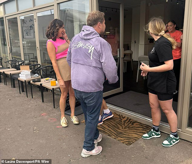 Corden was joined by Laura Davenport (left) as he chatted with locals on Barry Island.