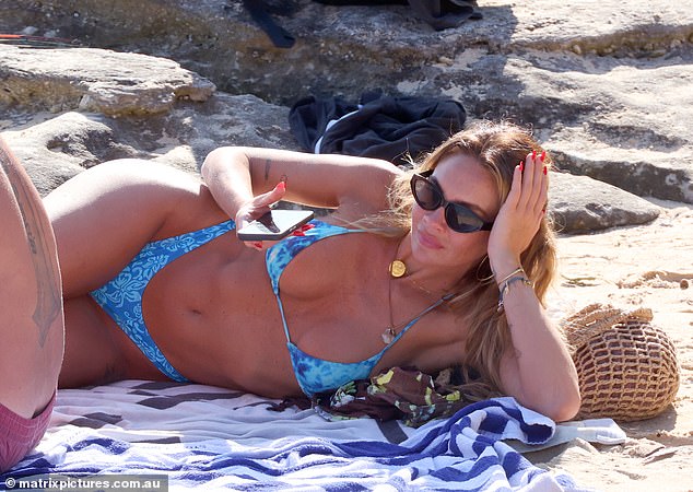 Mother-of-two Rachael showed off her sensational figure in a blue tie-dye bikini top and floral high-cut bottoms.