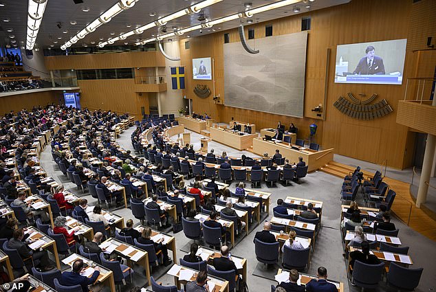 Swedish lawmakers (pictured in the Swedish Parliament in March 2023) decided that starting July 1, fathers will be able to transfer up to 45 days of their paid parental leave to a friend or family member, while single fathers and mothers can transfer up to 90 days