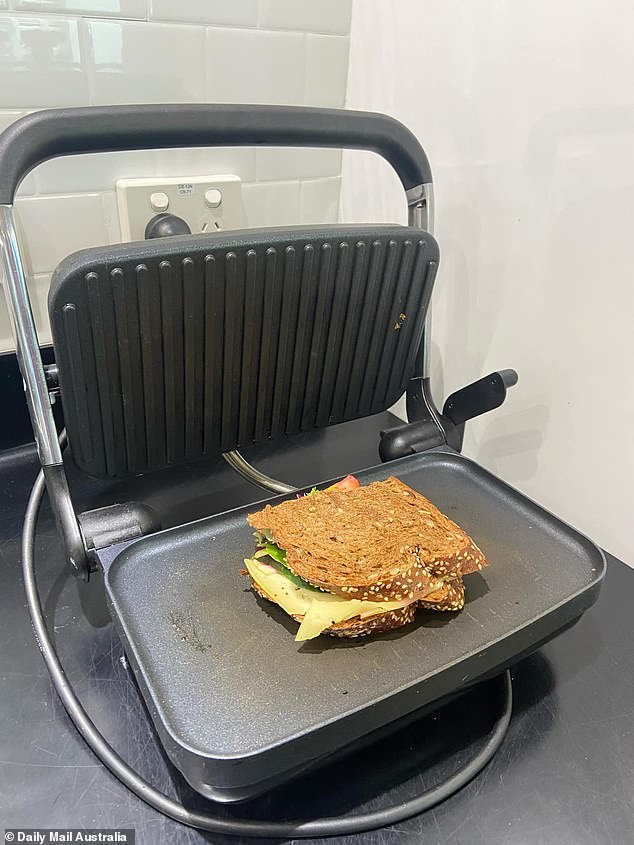 According to the operating instructions for a Russell Hobbs sandwich maker, the green light will appear when the appliance has reached operating temperature. It will then cycle on and off while the thermostat maintains the temperature.