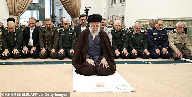 Iran's Supreme Leader Ayatollah Ali Khamenei leads prayers with a group of Iranian armed forces commanders in Tehran