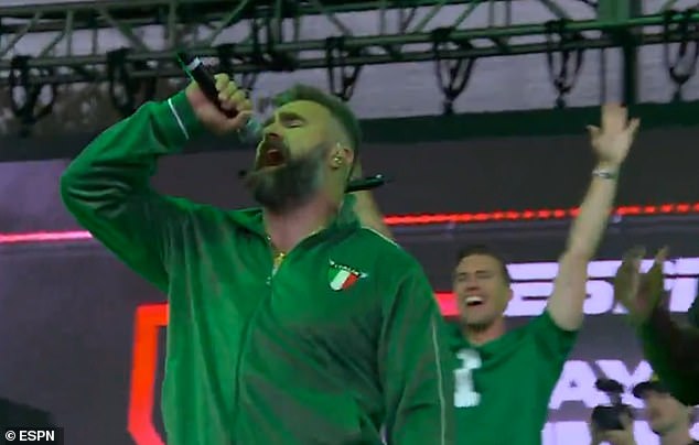 Kelce yelled into a microphone on stage as he cheered on Philadelphia Eagles fans.