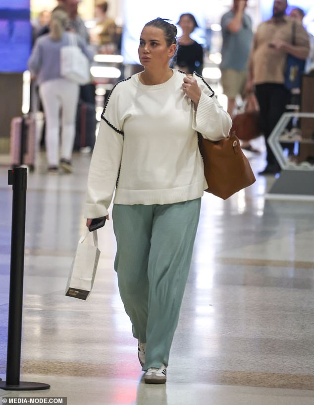 The popular Nine TV presenter, 41, was spotted strolling through Sydney Airport's domestic terminal on Wednesday evening in casual clothes after a long day of speaking engagements.