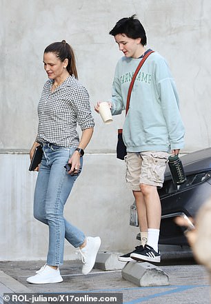 Similarly, her 15-year-old son Fin, who is one of three children she shares with ex-husband Ben Affleck, sported an oversized sweatshirt, cargo shorts and comfy sneakers.