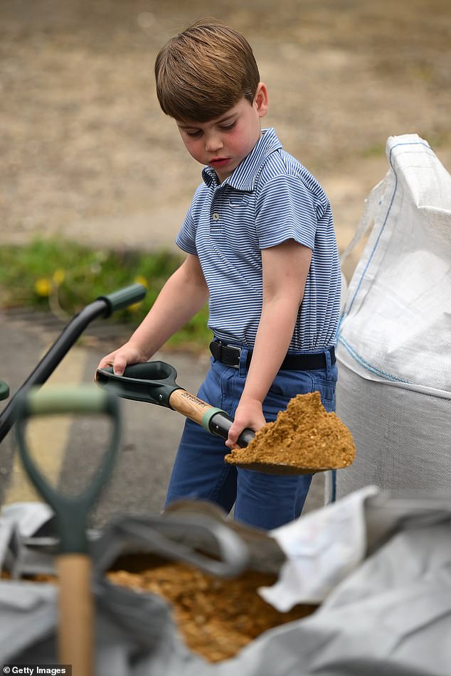 Louis pouring sand into a wheelbarrow during an engagement in Slough last year, where Kate called him 