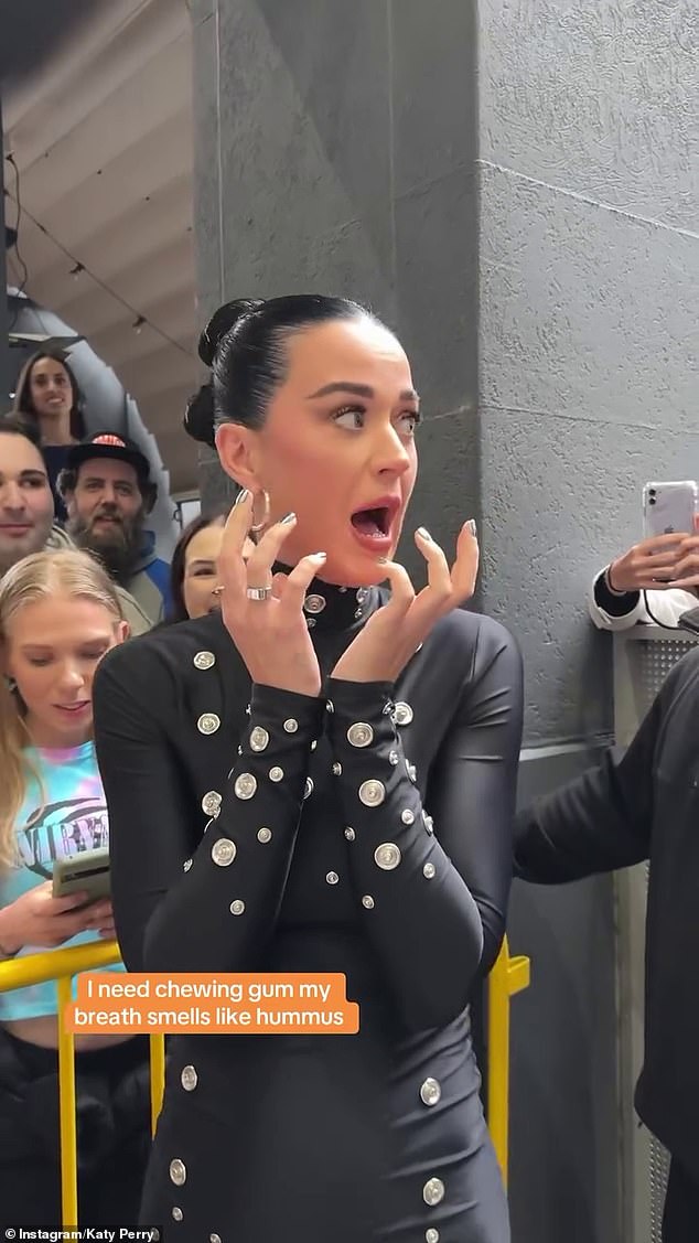 One clip showed a panicked Katy climbing up a piece of gum while meeting her fans due to the state of her breath.