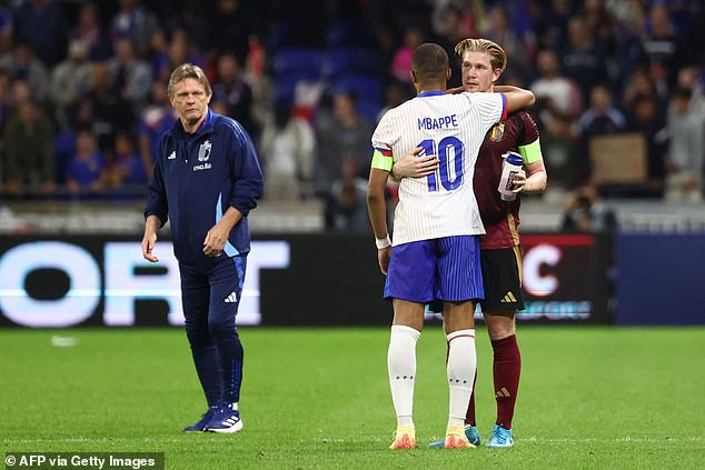 De Bruyne approached manager Frank Vercauteren (right) and appeared to make clear his desire to 