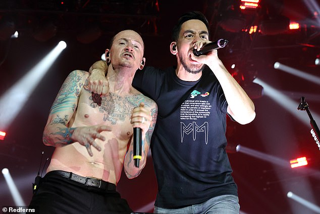 'While publicly speaking about his general difficulties with life during the press edition of One More Light, he was privately telling loved ones about a specific problem: the urge to drink had consumed his thoughts once again. (Chester photographed with Mike Shinoda on July 3, 2017, 17 days before his death)