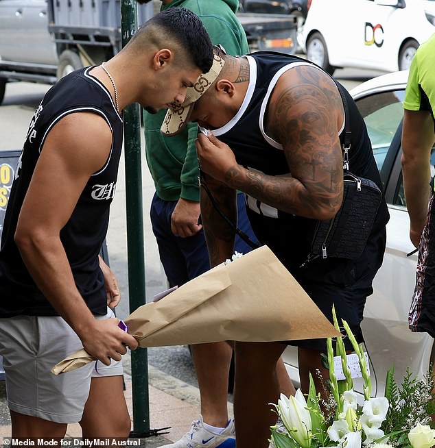 Mourners comforted each other outside the restaurant on Tuesday morning (pictured) as devastated friends and family came to terms with Mr Filihiahekava's death.