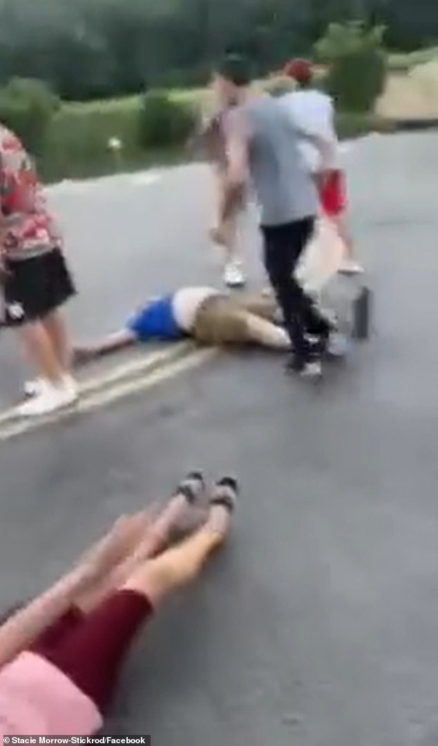 Prosecutors determined that the veteran Ohio weatherman (far left) did not break the law during the road rage incident in the parking lot of the Montgomery Inn Boathouse on June 22 in Cincinnati.