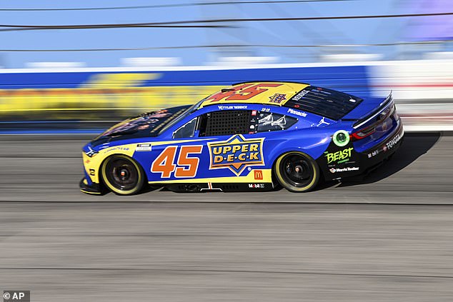 Tyler Reddick drives through Turn 1 during a NASCAR Cup Series race at Darlington