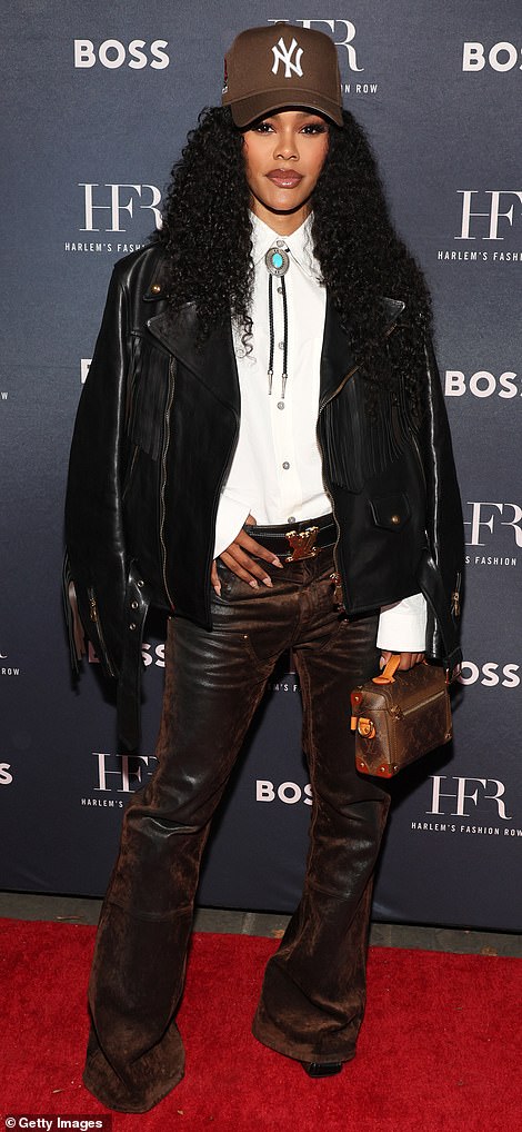 Teyana Taylor, 33, rocked a country look in a white button-down shirt tucked into leather pants, a bolo tie and a black leather jacket with fringe.