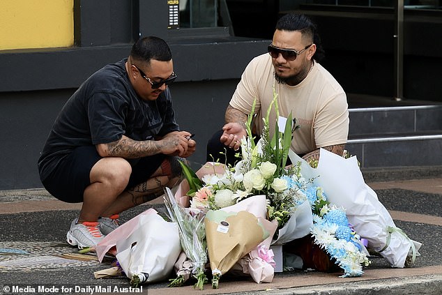 Loved ones left flowers and cards outside the restaurant where Mr Filihiahekava was killed throughout the day on Monday and a vigil was held on Tuesday night.