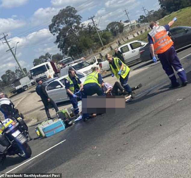 Paramedics were seen treating the motorcyclist after the crash in Prospect on Tuesday.