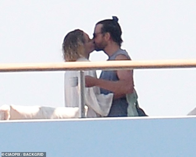 At one point, away from the group, Gigi and Bradley were seen sharing some affectionate moments as they cuddled up on one of the decks of the spacious yacht.