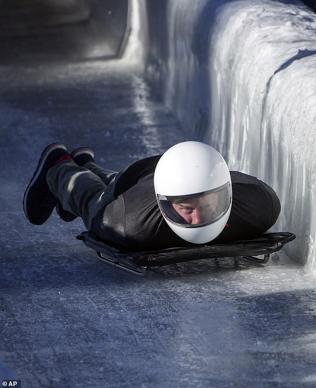 The Duke of Sussex slides down the track on a skeleton sled during an Invictus Games training camp. Prince Harry, Duke of Sussex, slides down the track on a skeleton sled during an Invictus Games training camp in February.