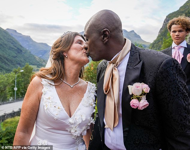 Princess Martha Louise of Norway and her American fiancé Shaman Durek delighted crowds lining the streets by sharing a kiss after their wedding.