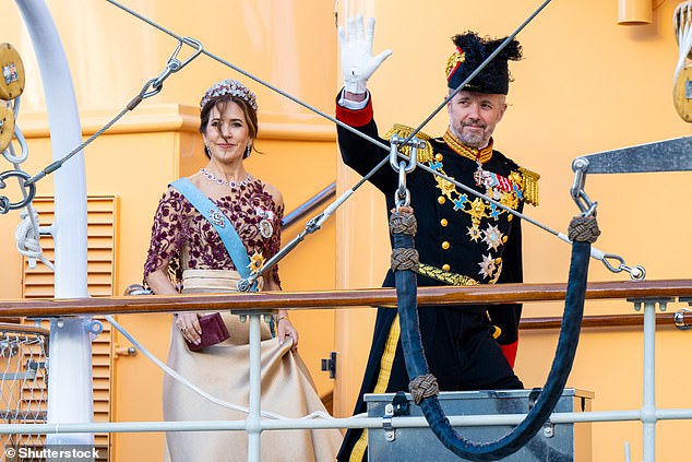 Queen Mary leaves the royal yacht Dannebrog to attend a state banquet at the royal palace in Stockholm, on the first day of the Danish royals' first state visit to Sweden in May.