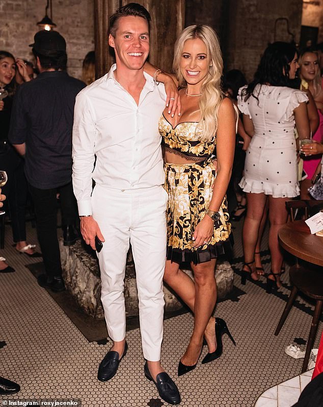 Roxy left for Singapore with her family in 2023, determined to never return to Sydney. Pictured here with husband Oliver Curtis