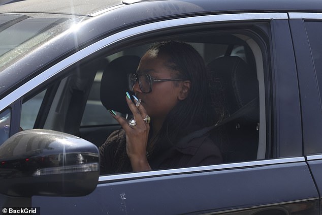 The former first daughter smoked a cigarette from the driver's seat of her car before driving off in Beverly Hills.