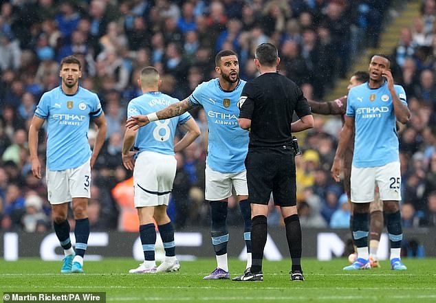 Kyle Walker (third from right) and his Manchester City teammates were left fuming after the equaliser.