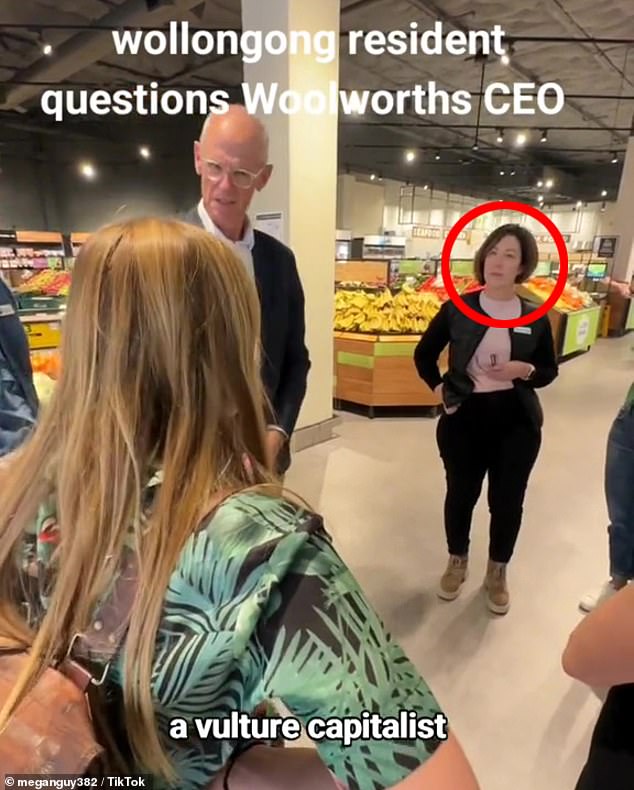 Megan Guy gained national media attention when she confronted Woolworths chief executive Amanda Bardwell (circled) at her local supermarket in Wollongong on Tuesday.