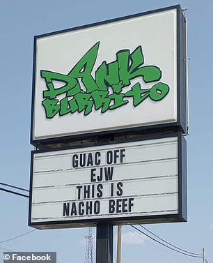 Dank Burrito's sign read: 'Gauc out of EJW, this is nacho meat'