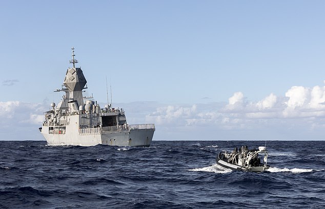 Both HMAS Arunta and HMAS Canberra en route to rescue the sailors (pictured, HMAS Arunta during a training exercise)