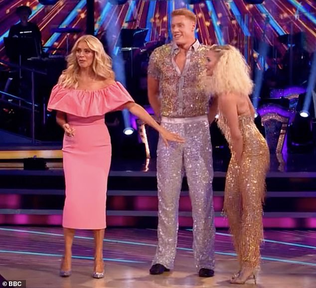 The professional blonde kicked off the episode as she and Olympian Tom Dean strutted in sequins in a disco-inspired Cha Cha, but her skin-tight sequin jumpsuit ripped.