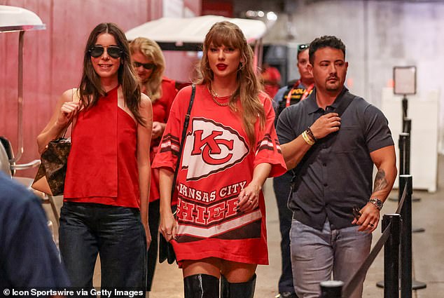 Earlier this month, he sported an oversized Chiefs jersey and black over-the-knee boots while celebrating the Chiefs' win against the Cincinnati Bengals (seen above).