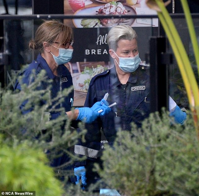 Oscar, 16, was allegedly stabbed at Woodgrove Shopping Centre in Melton West shortly before midday on Tuesday. Forensic officers are pictured at the scene