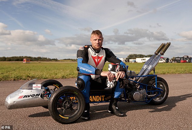 Freddie Flintoff on a motorised tricycle while filming a series of the BBC programme Top Gear