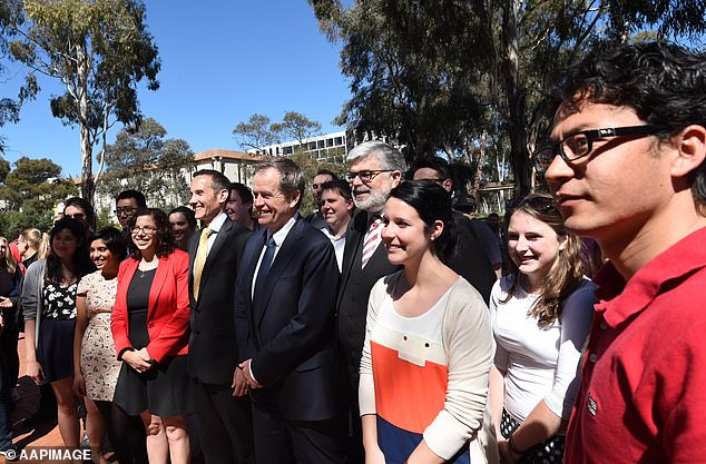 Bill Shorten is pictured with students at the University of Canberra in 2014. He now has a job there.