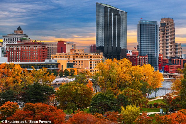 The downtown skyline of Grand Rapids, Michigan offers an incredible view of the city and surrounding nature during peak foliage season.