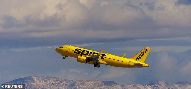 A white man on a Spirit Airlines flight threatened to rip her head off. 