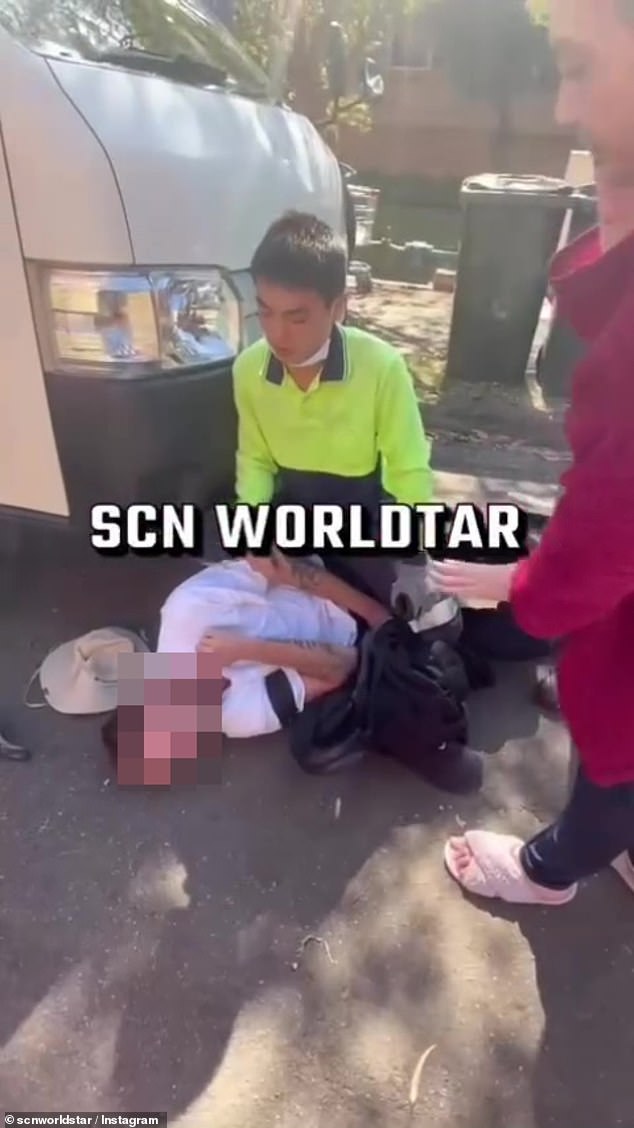 The video shows the alleged attacker pinned to the ground.