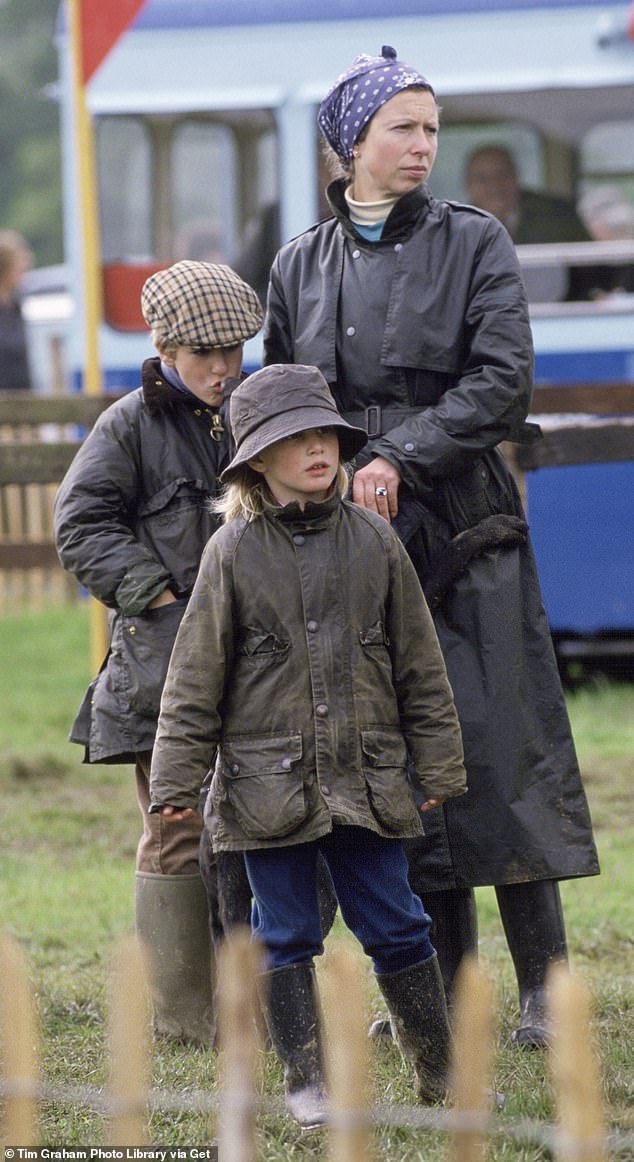 The Princess Royal, known as the hardest working royal, is famous for recycling her wardrobe, often wearing clothes she has had for 30 or 40 years (Princess Anne with her children, Zara and Peter 1987)