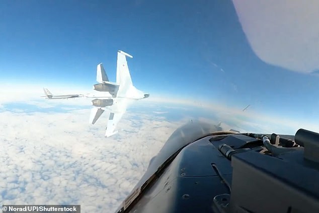 Video of the interaction shows a Russian plane flying past an American plane, tilting rapidly left and right.