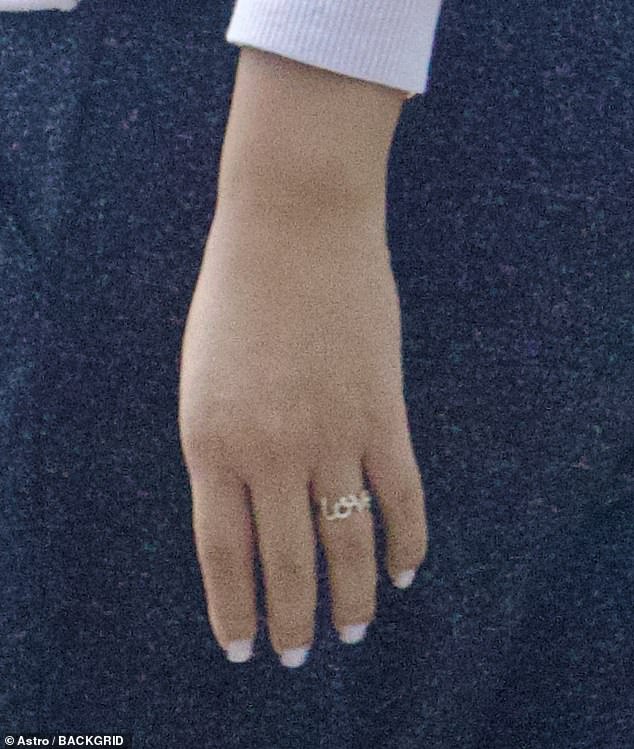 Her ring is said to be for mom and grandma, according to the publication, who also noted that none of the 'Love' accessories she wears are from Diddy.