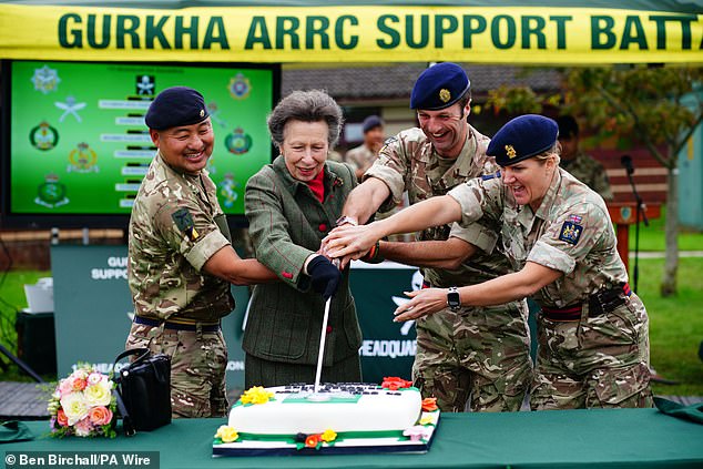 Princess Anne also cut a huge celebration cake with a large kurki, the traditional knife used by the Gurkhas.