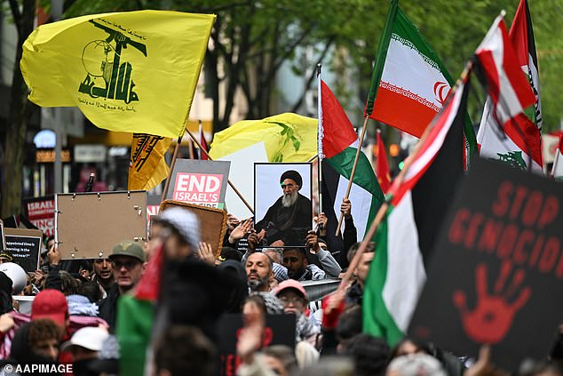 Melbourne protesters were seen holding up framed photographs of recently assassinated Hezbollah chief Hassan Nasrallah.