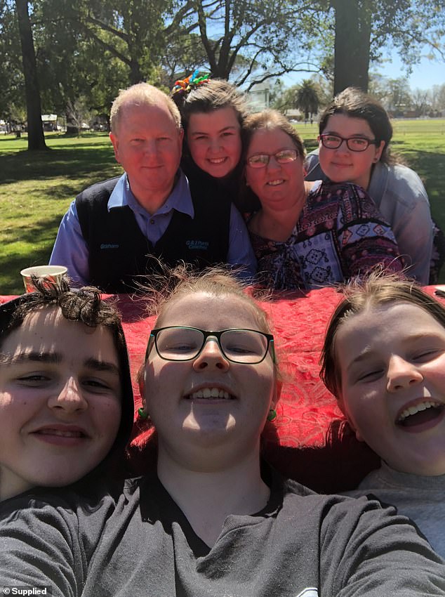 The Tait family: Coach Graham and kind head teacher Sue (above with her five children) made 