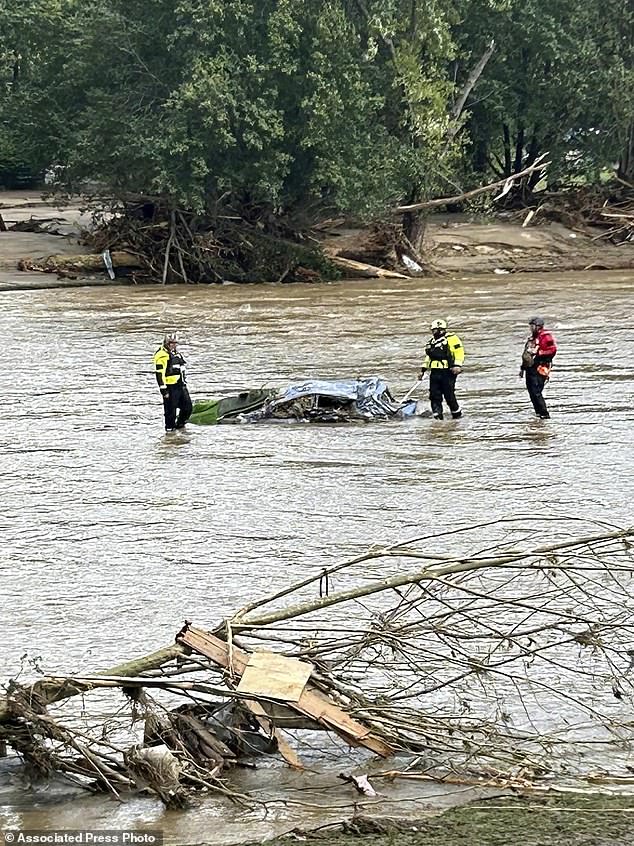 Pamlico County Rescue Team rescue workers are shown working after Helene in the Chimney Rock area.