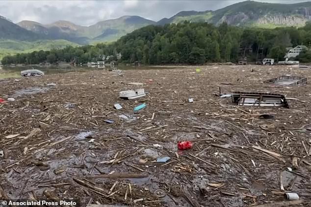 Flood debris from Hurricane Helene seen floating in Lake Lure