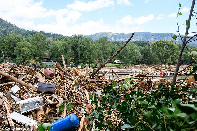 A wall of water rushed down the Broad River, washing away most of the structures along Main Street in Chimney Rock.