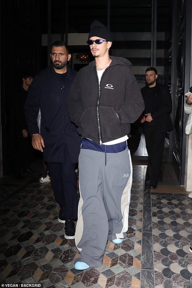 The former footballer opted for a casual look when he headed to the Costes Hotel in the French capital after sweeping the catwalk at Paris Fashion Week.