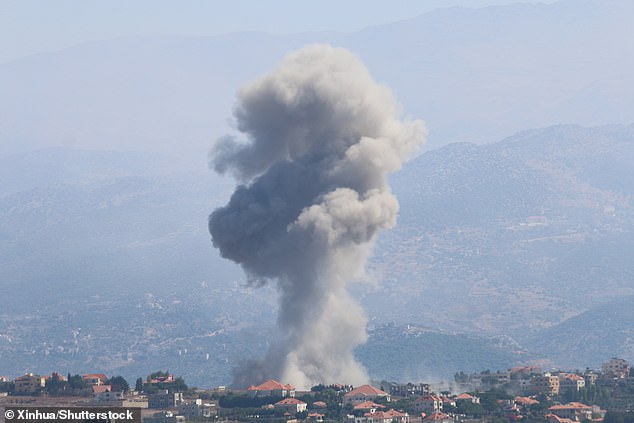 Smoke rises after an Israeli airstrike on the city of Khiyam, southeast Lebanon.