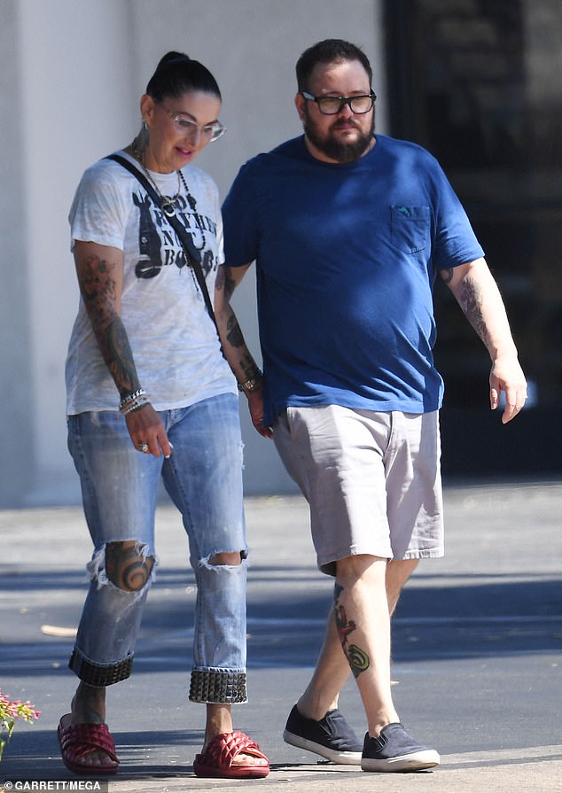 Chaz and Shara held hands while walking down the sidewalk in Hollywood on Sunday.