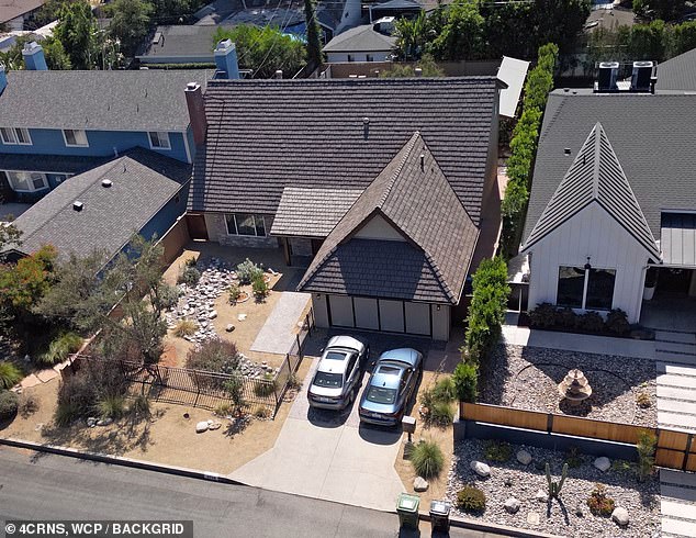 Aerial images show the house complete with a backyard pool, fencing and a front yard dotted with gray stones, desert brush and double parking spaces.